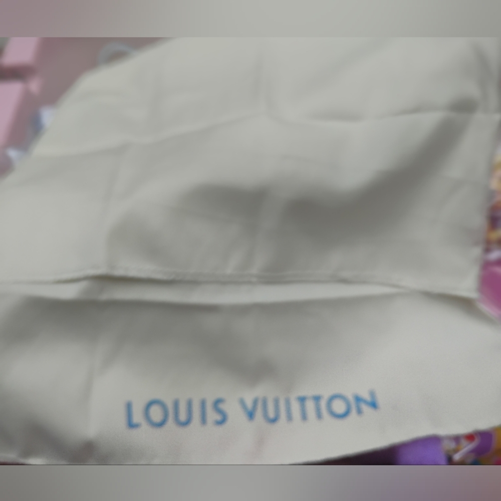 Louis Vuitton Cream Bag with Blue Logo